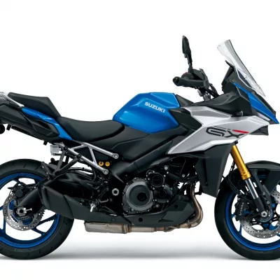 Vista lateral de la Suzuki GSX-S1000 GX 2025 en color azul Tritón